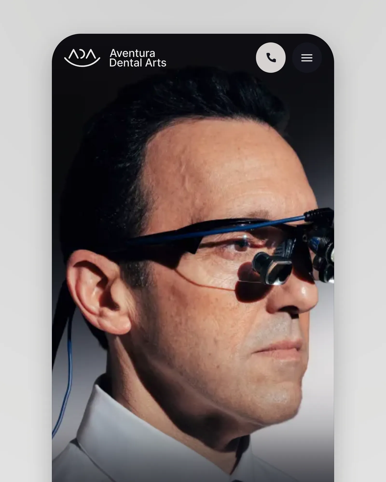 Aventura Dental Arts — the brand and website Axtra Studios designed, its technology page on a phone