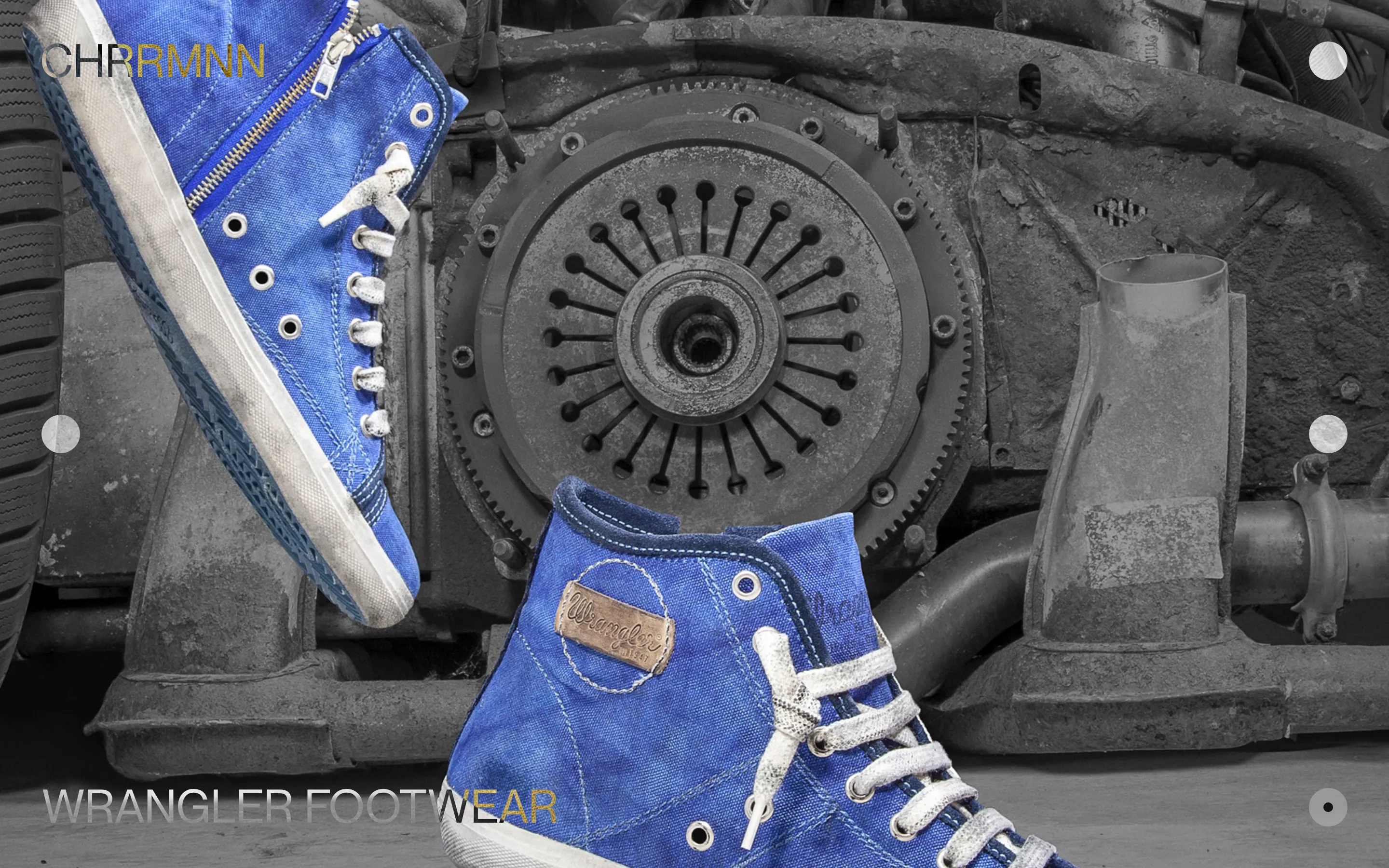 The Wrangler Footwear project page hero: two blue canvas high-tops on a rusted engine block shot in black and white, "CHRRMNN" top left and "WRANGLER FOOTWEAR" along the bottom, both reversed out of the photograph