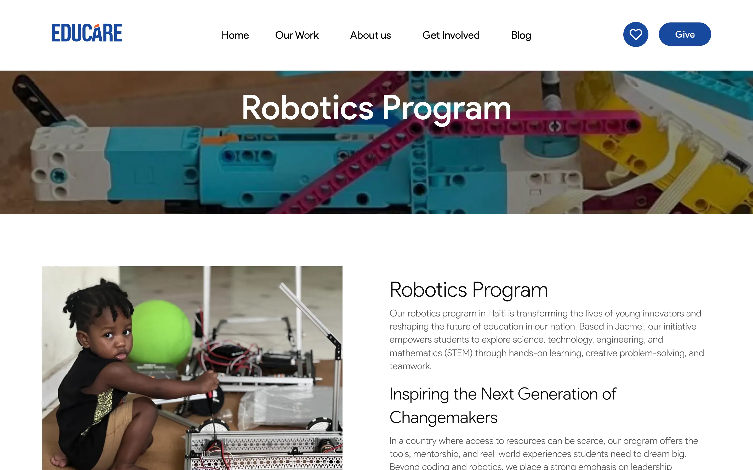 The Robotics Program page: a full-width photograph of a robot chassis under "Robotics Program", then a child at a table with a green balloon and a robot, beside "Inspiring the Next Generation of Changemakers"